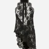 Asymmetrical lace top with flower detail on neck