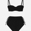 Balconette bikini top and laced high-waisted bikini bottoms