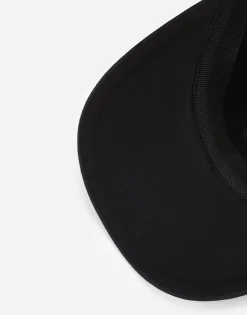 Baseball cap with branded tag