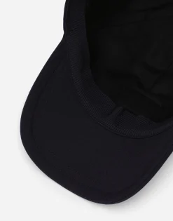 Baseball cap with logo tag