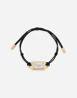 Bracelet with cord and logo tag