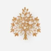 Brooch with branches, leaves and DG logo