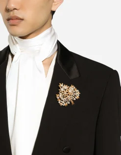 Brooch with branches, leaves and DG logo