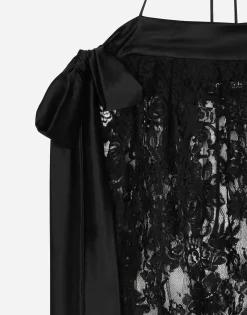 Calf-length Chantilly lace dress with satin details