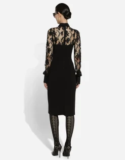 Calf-length jersey and lace dress with corset details