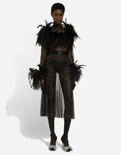 Calf-length stretch tulle dress with fusible rhinestones and rooster and ostrich feather embellishment