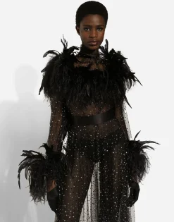 Calf-length stretch tulle dress with fusible rhinestones and rooster and ostrich feather embellishment