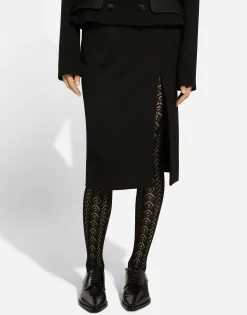 Calf-length wool gabardine skirt with slit