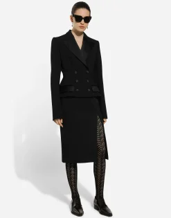 Calf-length wool gabardine skirt with slit