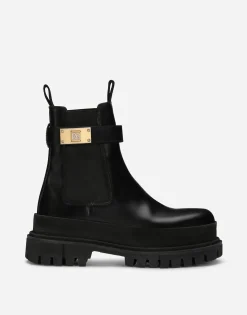 Calfskin ankle boots with branded strap