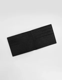 Calfskin bifold wallet with logo tag
