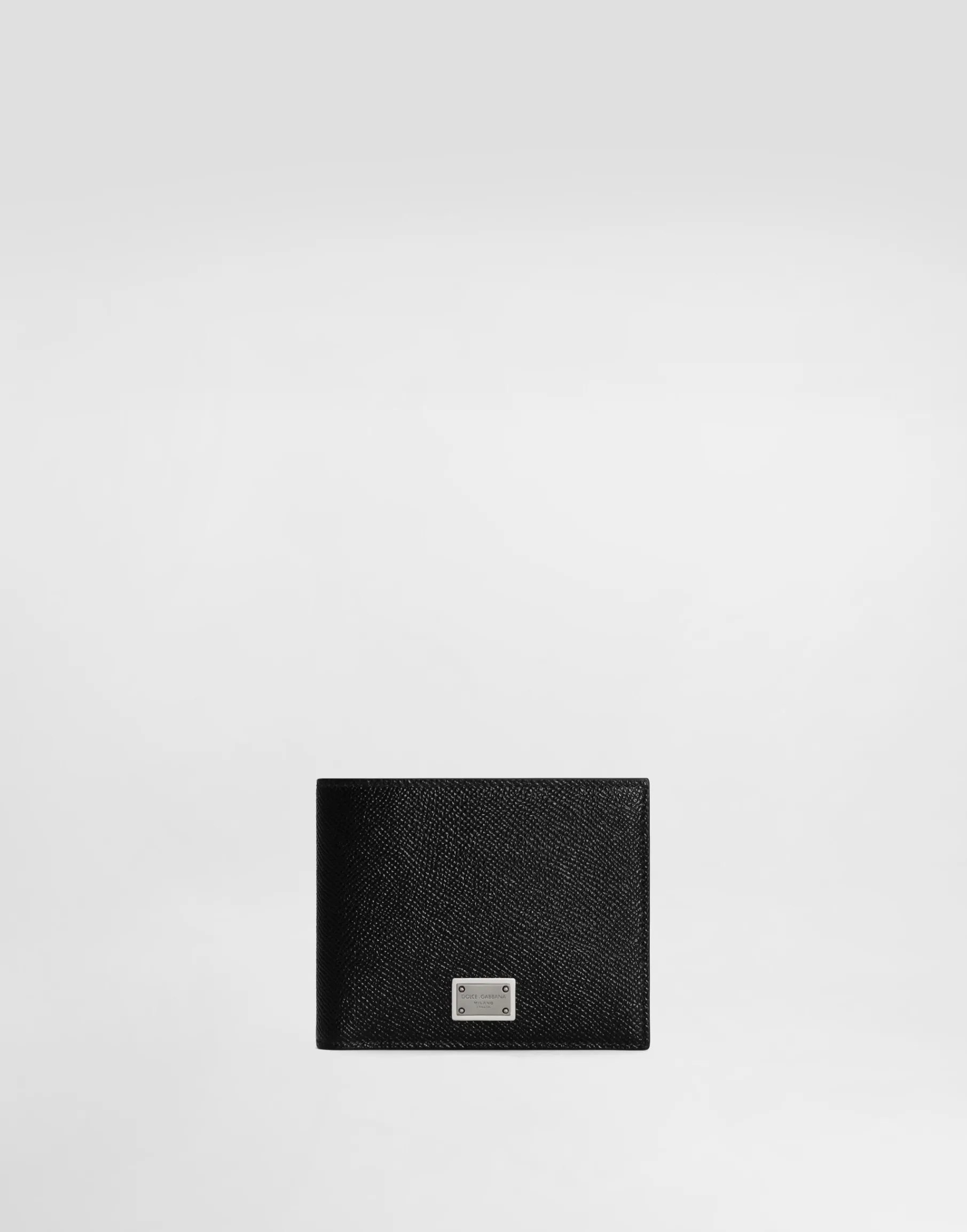 Calfskin wallet with coin pocket and logo tag