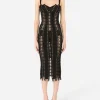 Charmeuse calf-length dress with laces and eyelets