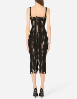 Charmeuse calf-length dress with laces and eyelets