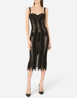 Charmeuse calf-length dress with laces and eyelets