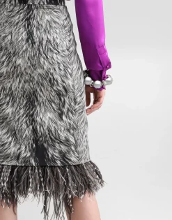 Charmeuse calf-length pencil skirt with fur print and feathered detailing