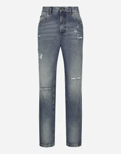 Classic blue denim jeans with abrasions