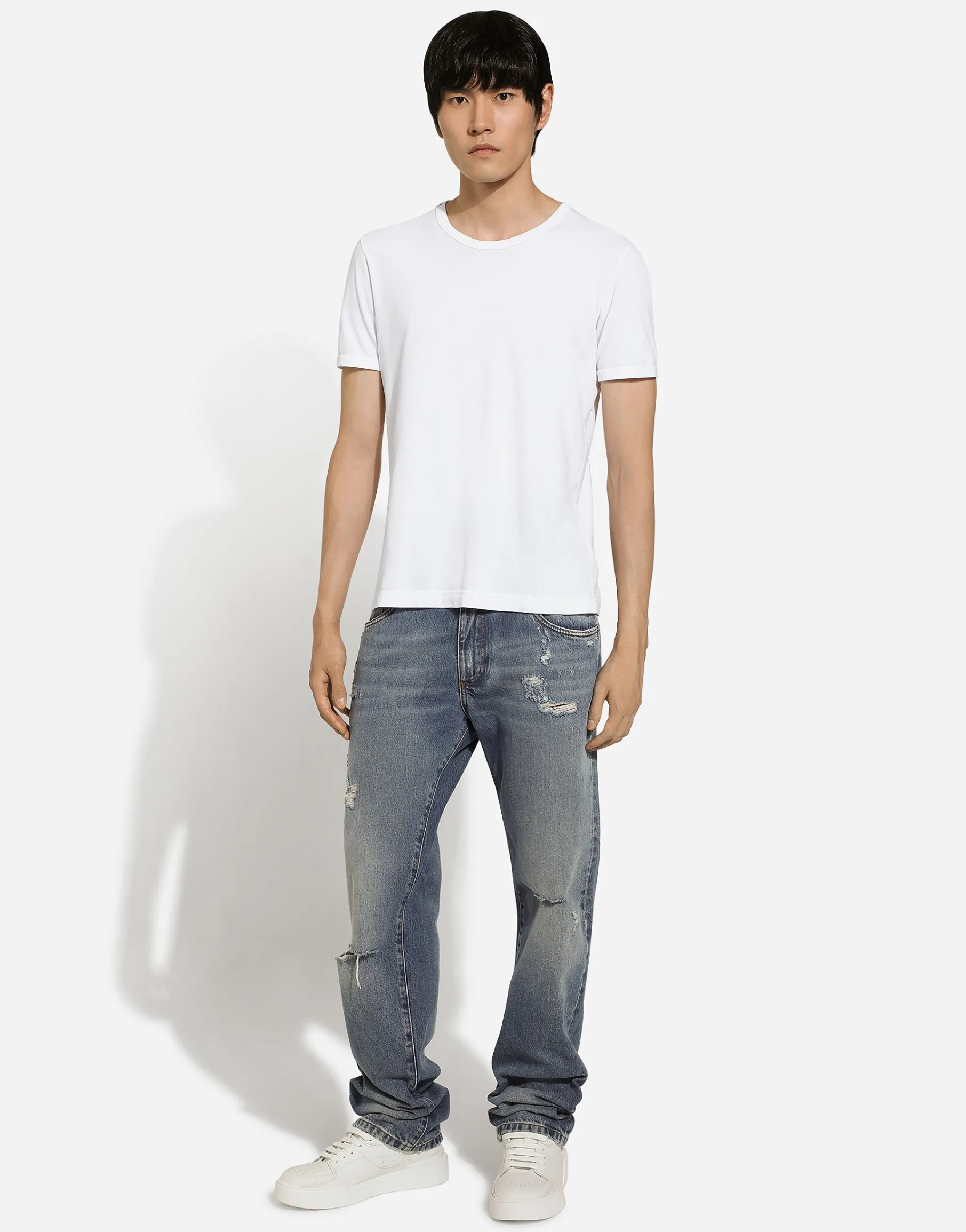 Classic blue denim jeans with abrasions