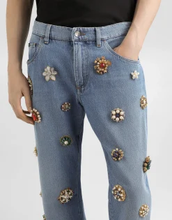 Classic cotton jeans with tag and bejeweled details