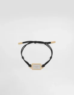 Cord bracelet with Dolce&Gabbana tag