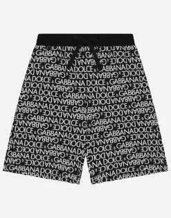 Cotton jogging shorts with the all-over logo print