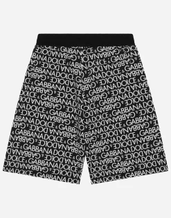 Cotton jogging shorts with the all-over logo print