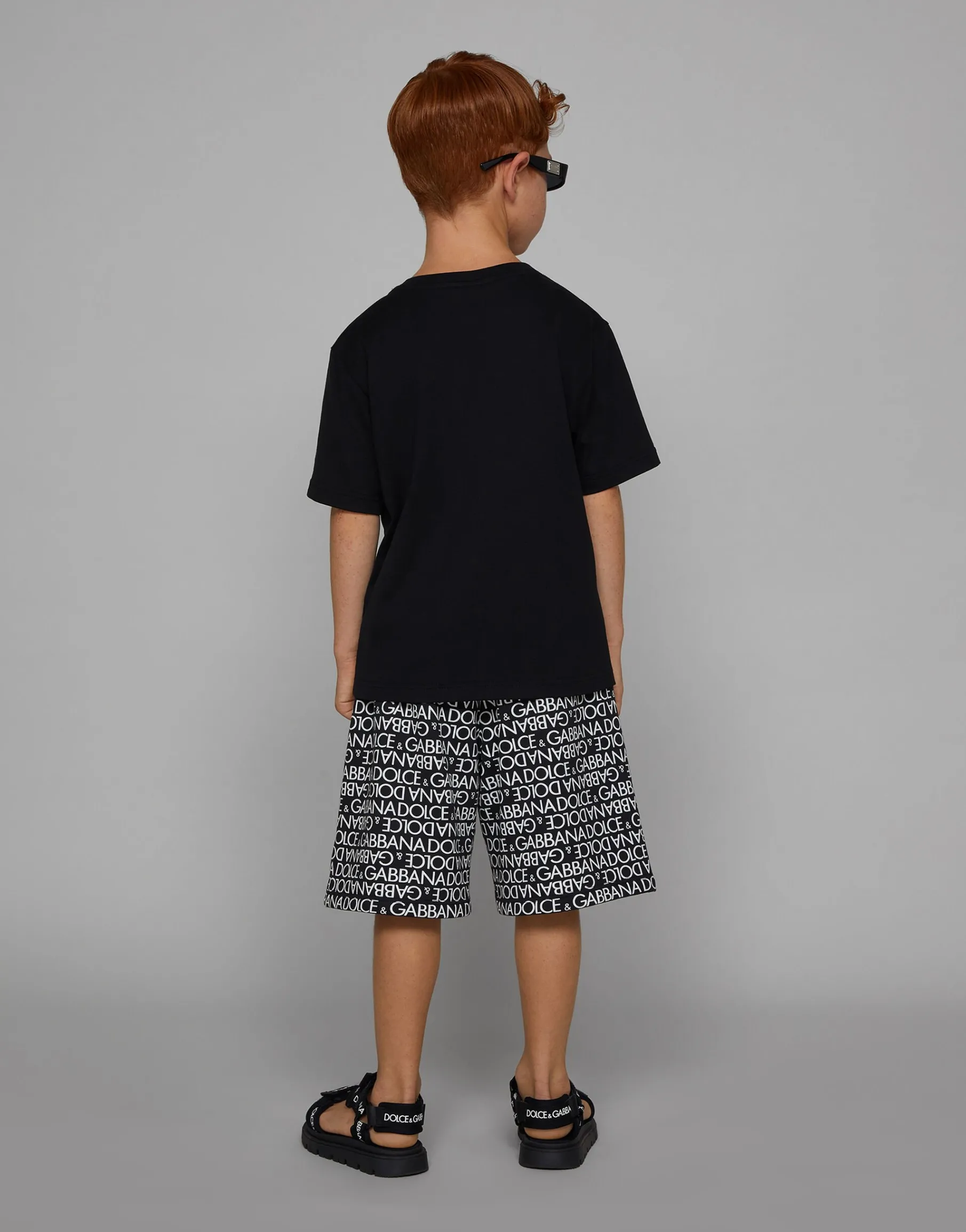 Cotton jogging shorts with the all-over logo print
