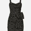 Cotton minidress with polka-dot print and bow detail