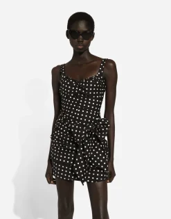 Cotton minidress with polka-dot print and bow detail