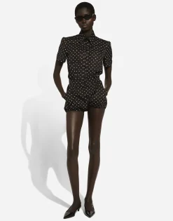 Cotton playsuit with polka-dot print