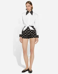 Cropped cotton poplin shirt with knot detail and polka-dot print