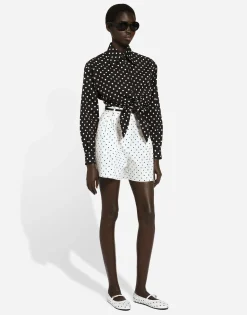 Cropped cotton poplin shirt with knot detail and polka-dot print