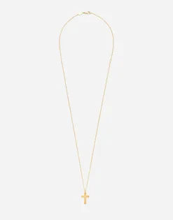 Cross pendant on yellow gold chain