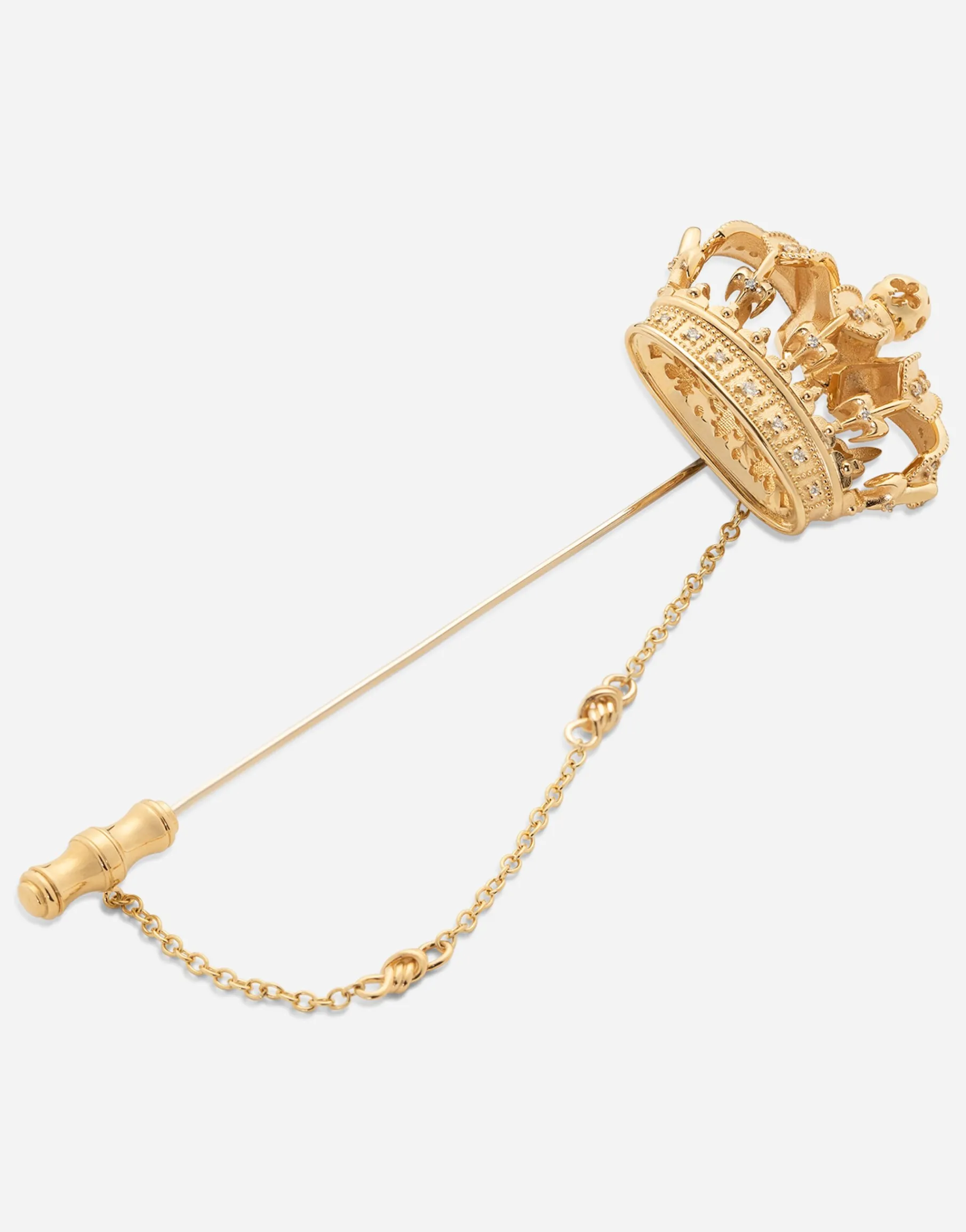 Crown stick pin brooch in yellow and white gold with curly gold thread embellishments and sphere