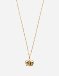 Crown yellow gold pendant with iron eye