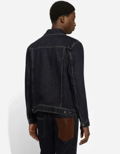 Denim jacket with embossed tag on leather