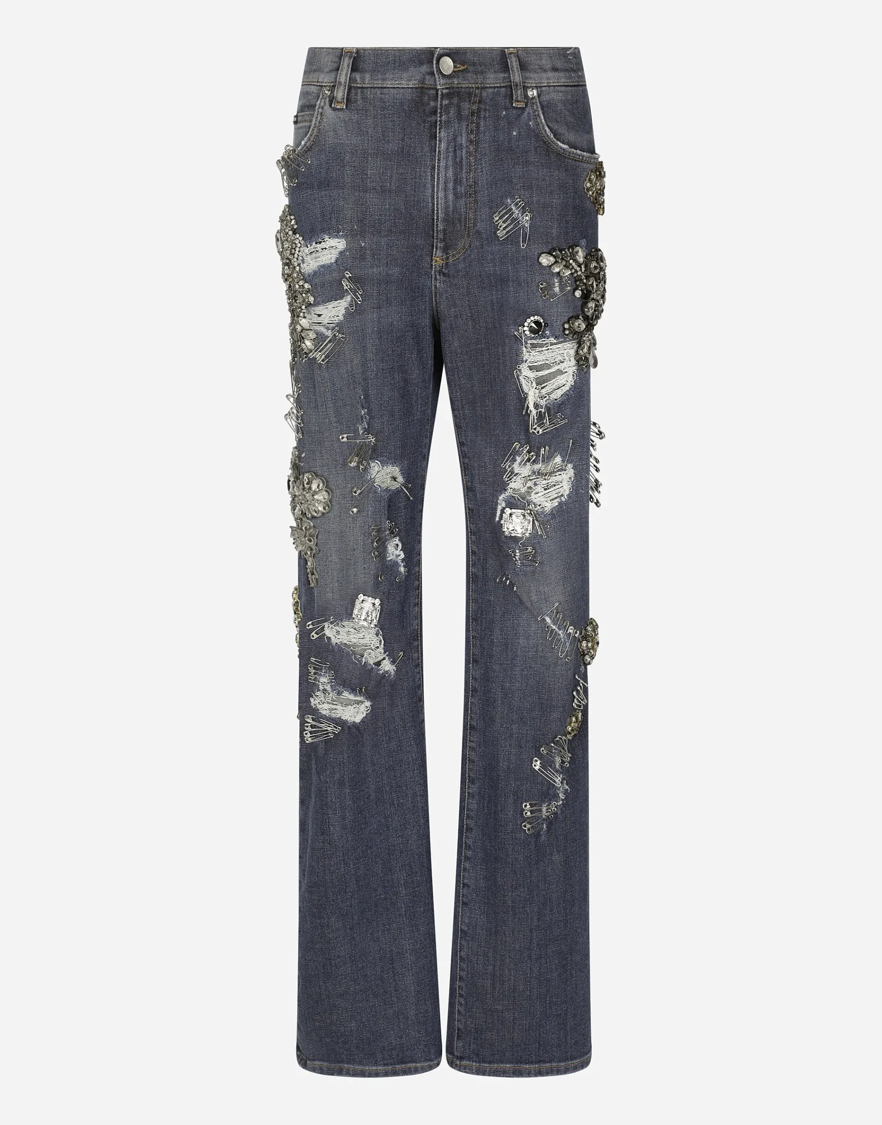 Denim jeans with ripped details and appliqués