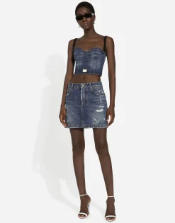 Denim mini skirt with rips