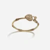 Devotion bracelet in yellow gold with diamonds