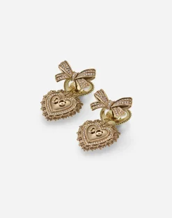 Devotion earrings in yellow gold with diamonds