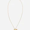 Devotion yellow and red gold rounded rectangular pendant with a red gold Virgin Mary medallion, horn and four-leaf clover pendants on yellow gold chain