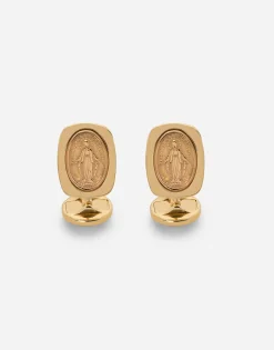 Devotion yellow gold cufflinks with a red gold Virgin Mary medallion