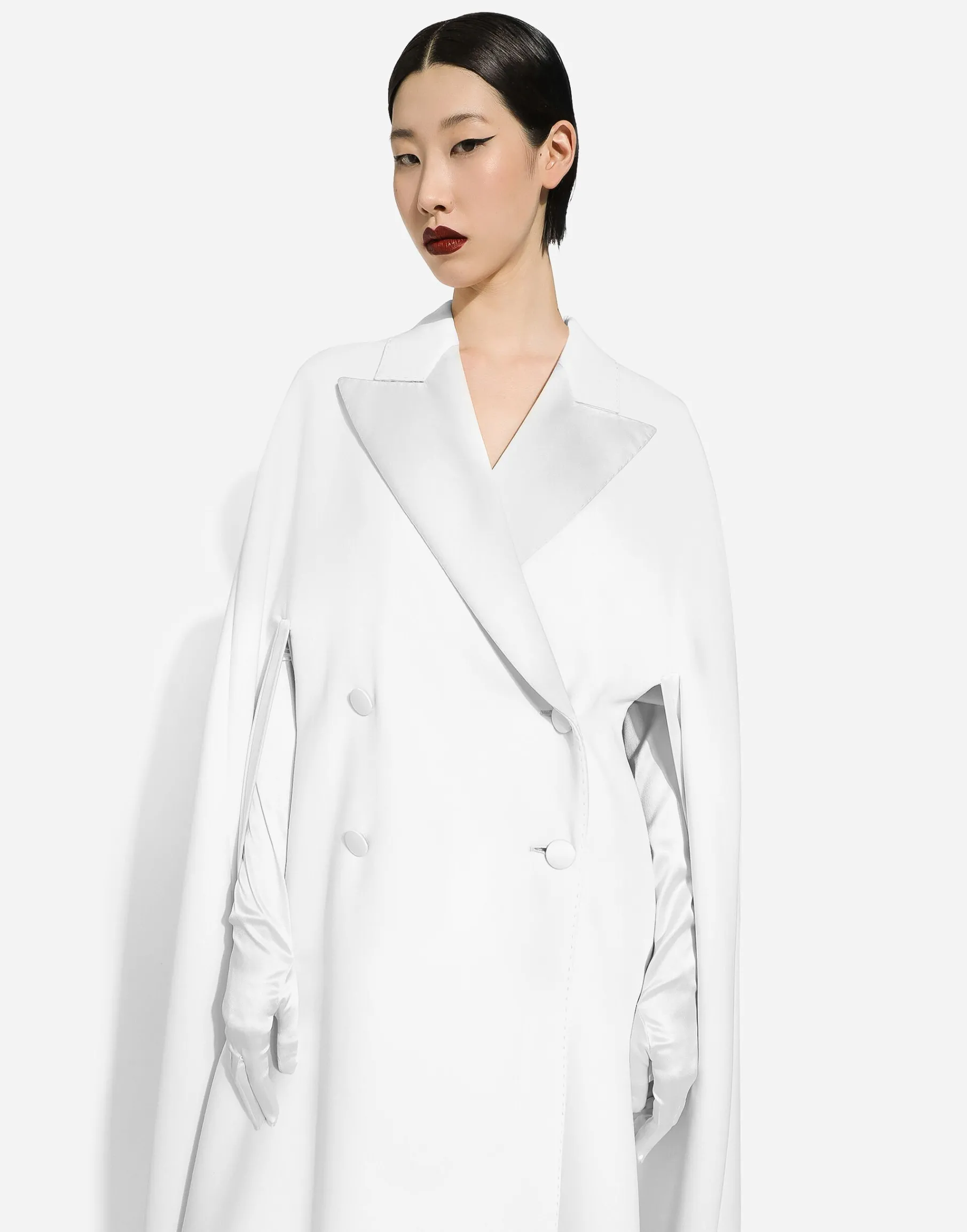 Double-breasted wool cape
