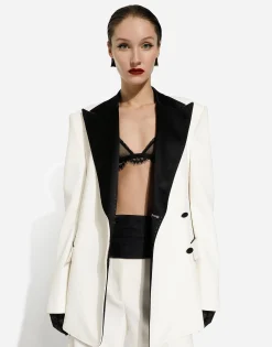 Double-breasted wool crepe jacket with tuxedo lapels
