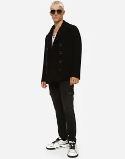 Double-breasted wool pea coat with branded tag
