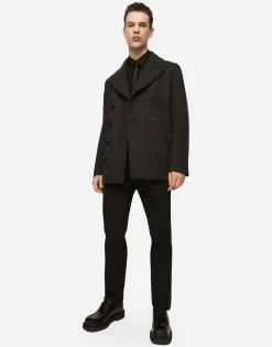 Double-breasted wool pea coat with branded tag
