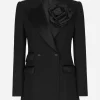 Double-breasted woolen jacket with flower appliqué
