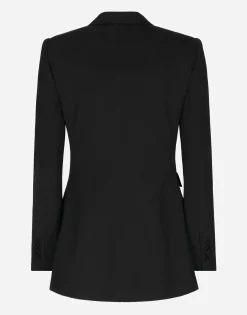 Double-breasted woolen jacket with flower appliqué
