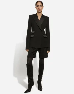 Double-breasted woolen jacket with side vents