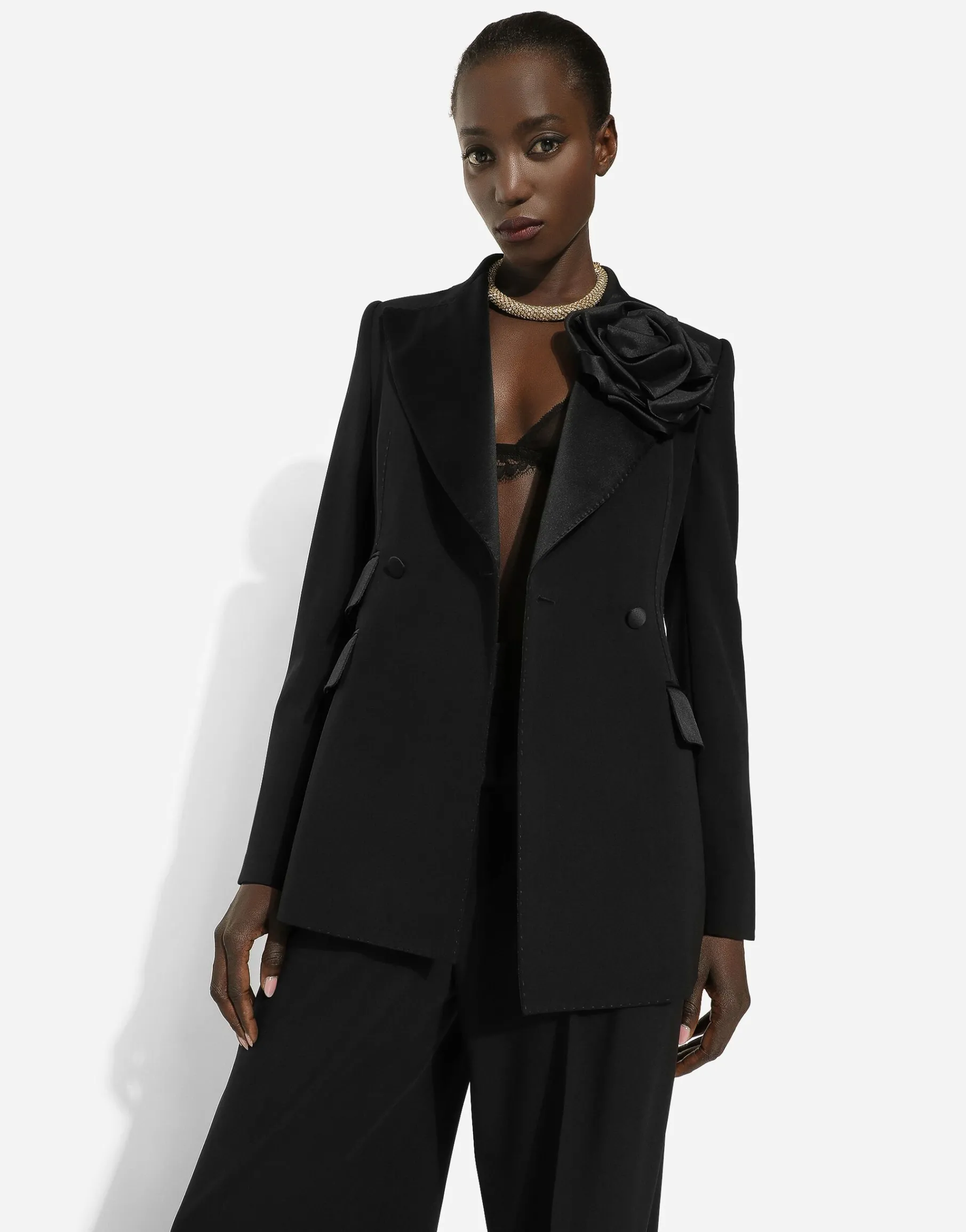 Double-breasted woolen jacket with flower appliqué